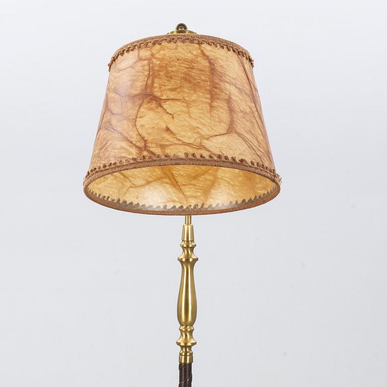 A floor lamp by Einar Bäckström, mid 20th century.