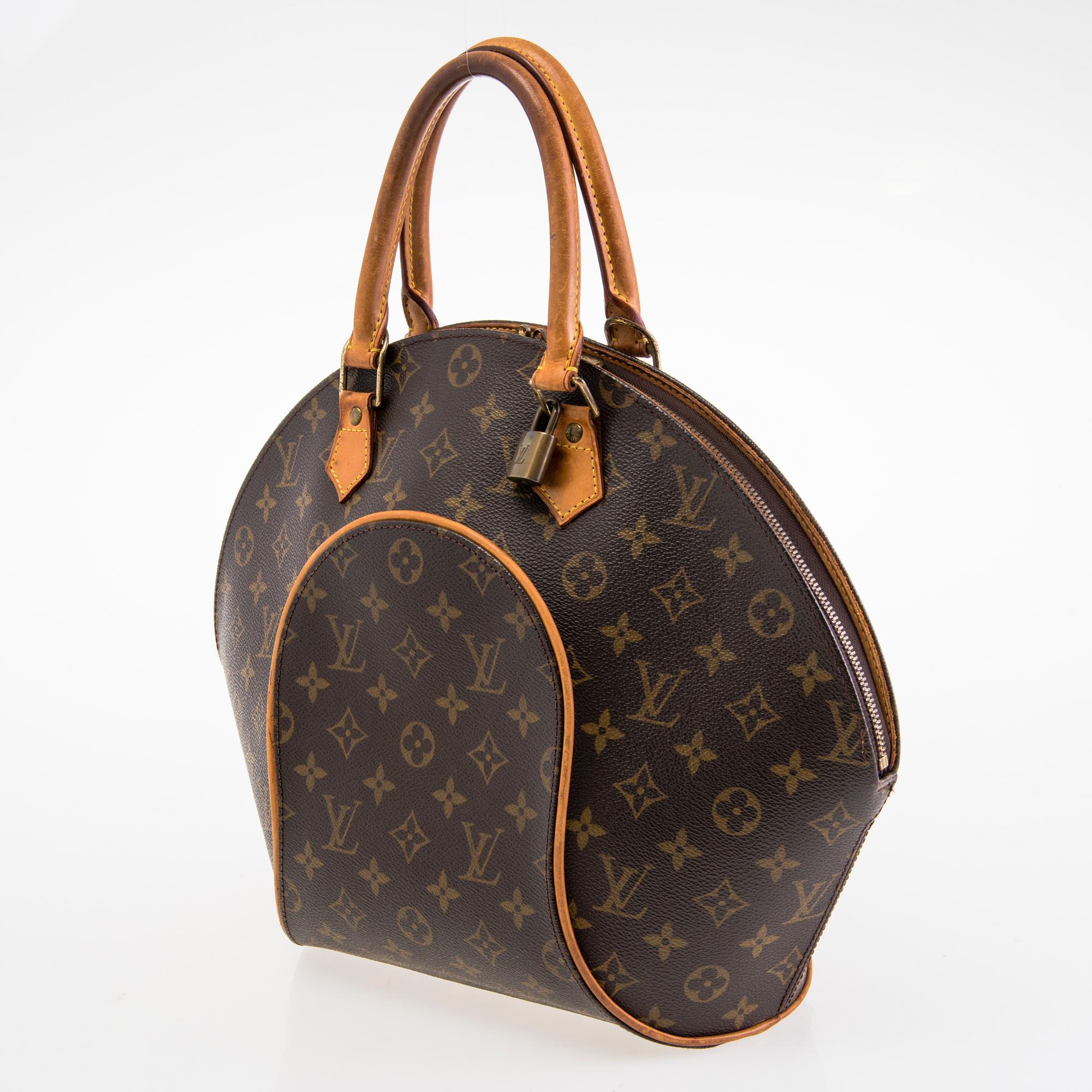LOUIS VUITTON MONOGRAM CANVAS ELLIPSE MM HAND BAG.