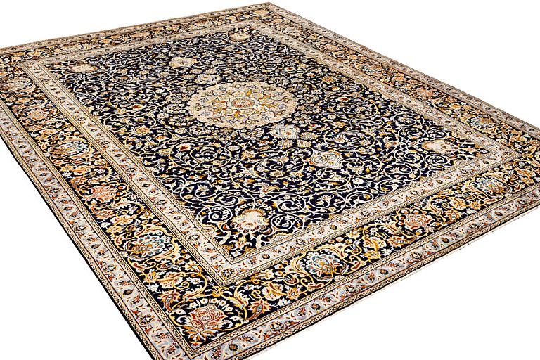 A Kashan carpet, c. 383 x 310 cm.