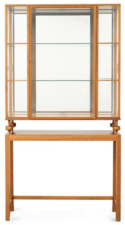 A Josef Frank glass cabinet, Firma Svenskt Tenn, model 2077.
