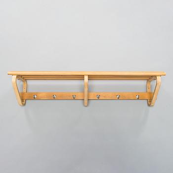 Alvar Aalto, hatthylla/ klädhängare för O.Y. Huonekalu-ja Rakennustyötehdas A.B, 1900-talets mitt.