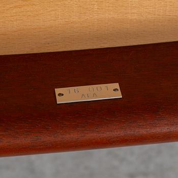 A teak armchair by Hans J Wegener for Johannes Hansen.