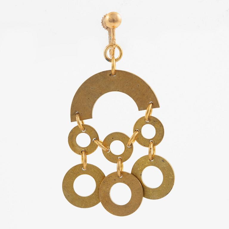 Siv Lagerström, two necklaces and one earring, gold-coloured metal.