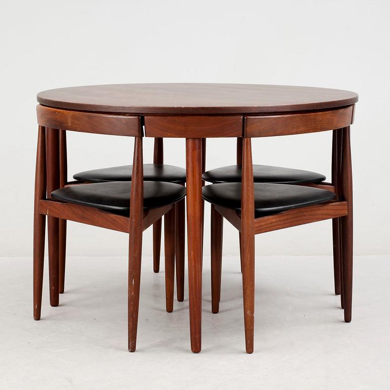 A Hans Olsen teak dining table with four chairs, Frem Røjle, Denmark 1950's.