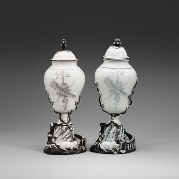 A pair of Swedish faience vases with covers, Marieberg, 18th Century.