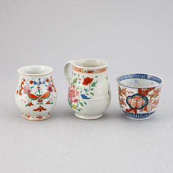 Two famille rose export porcelain jugs and a Japanese Imari bowl, Qing dynasty, Qianlong and Meiji.