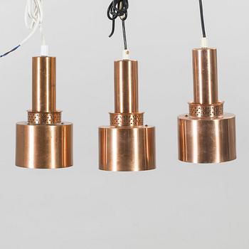 HANS-AGNE JAKOBSSON, three copper pendant lights from Markaryd.