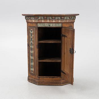 A Swedish cabinet, dated 1782.