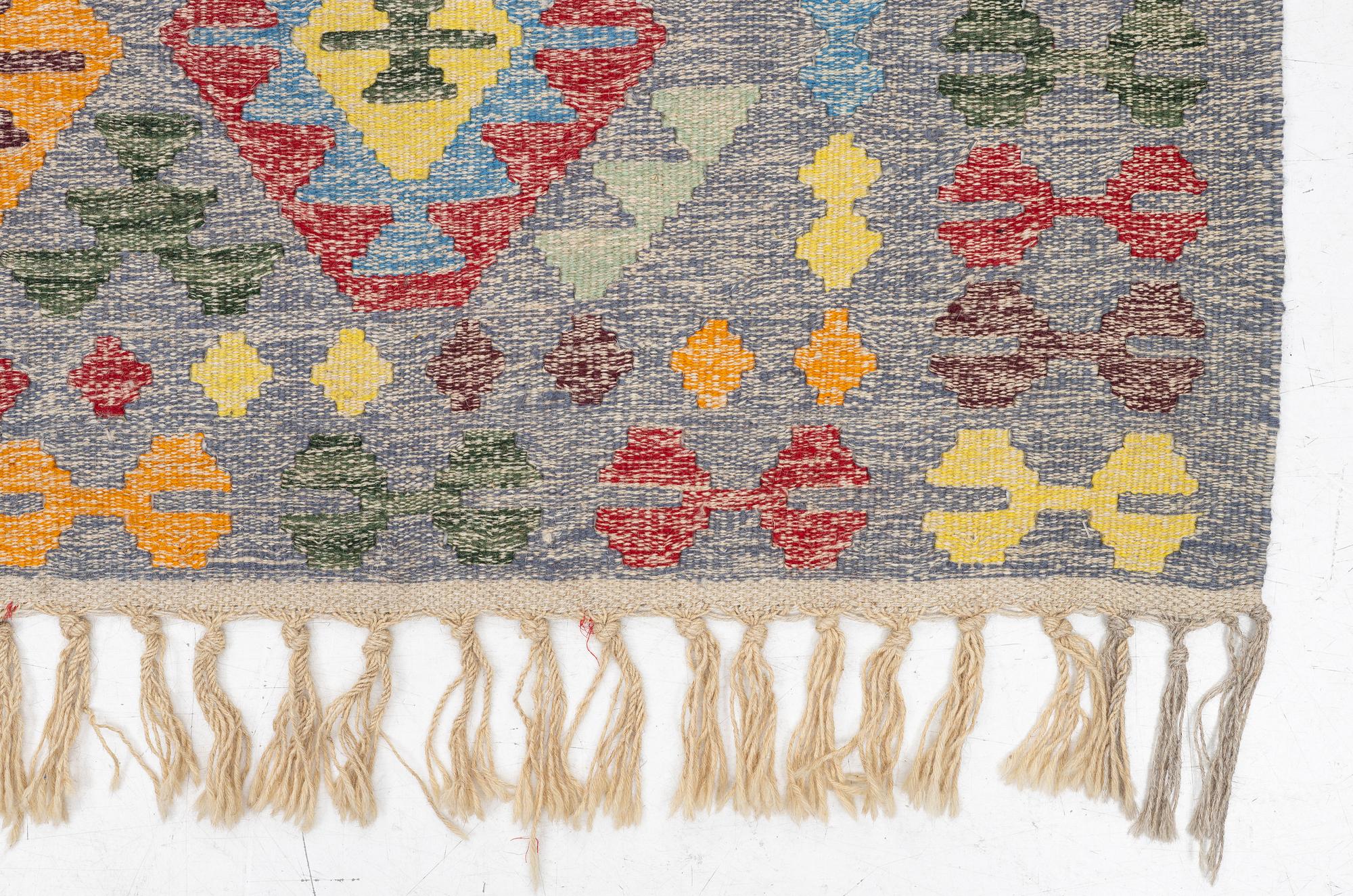 A Kelim carpet, c. 309 x 180 cm.