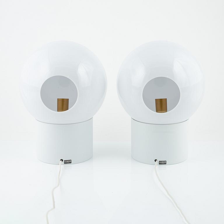 Uno & Östen Kristiansson, a pair of white plastic 'Luno' model 1241 table lights, Luxus, Vittsjö.