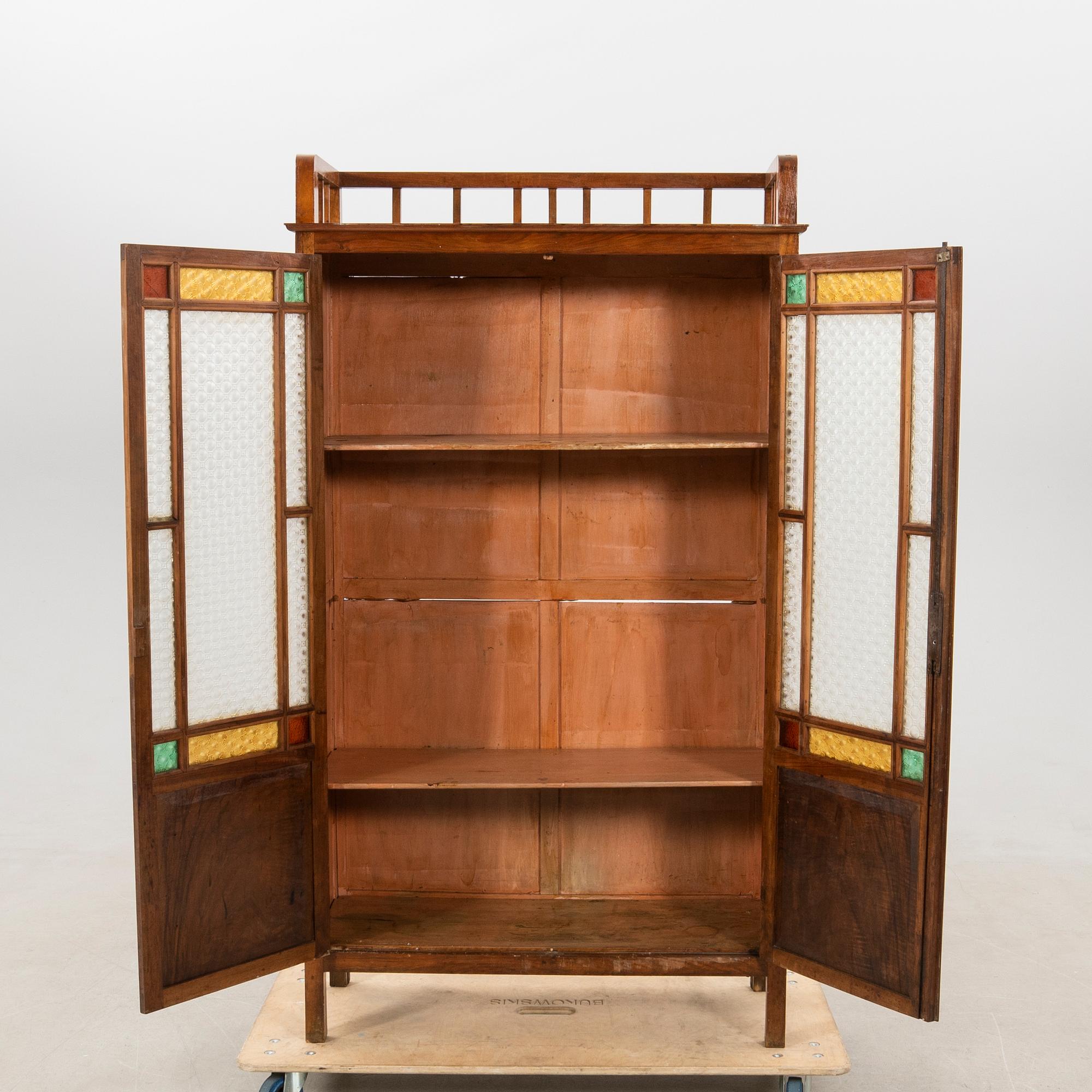 Cabinet, early 1900s.