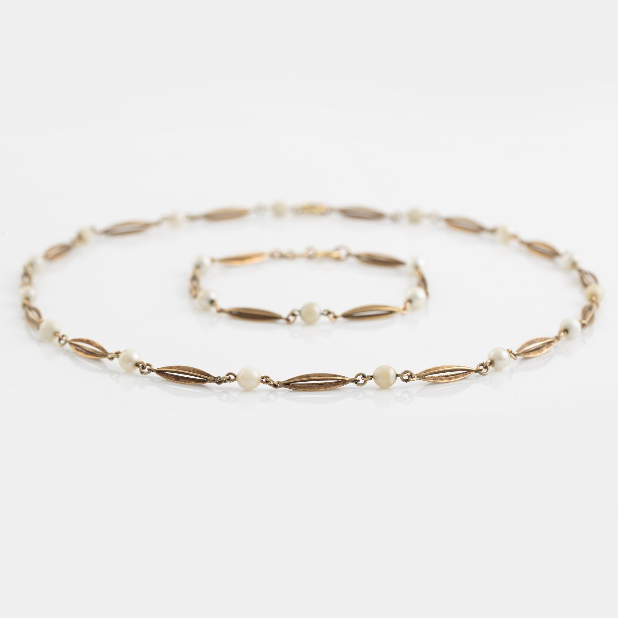 Bracelet and necklace, low fineness gold and pearls.