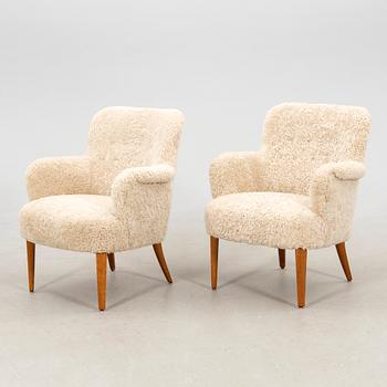 Armchairs, a pair from the 1940s.