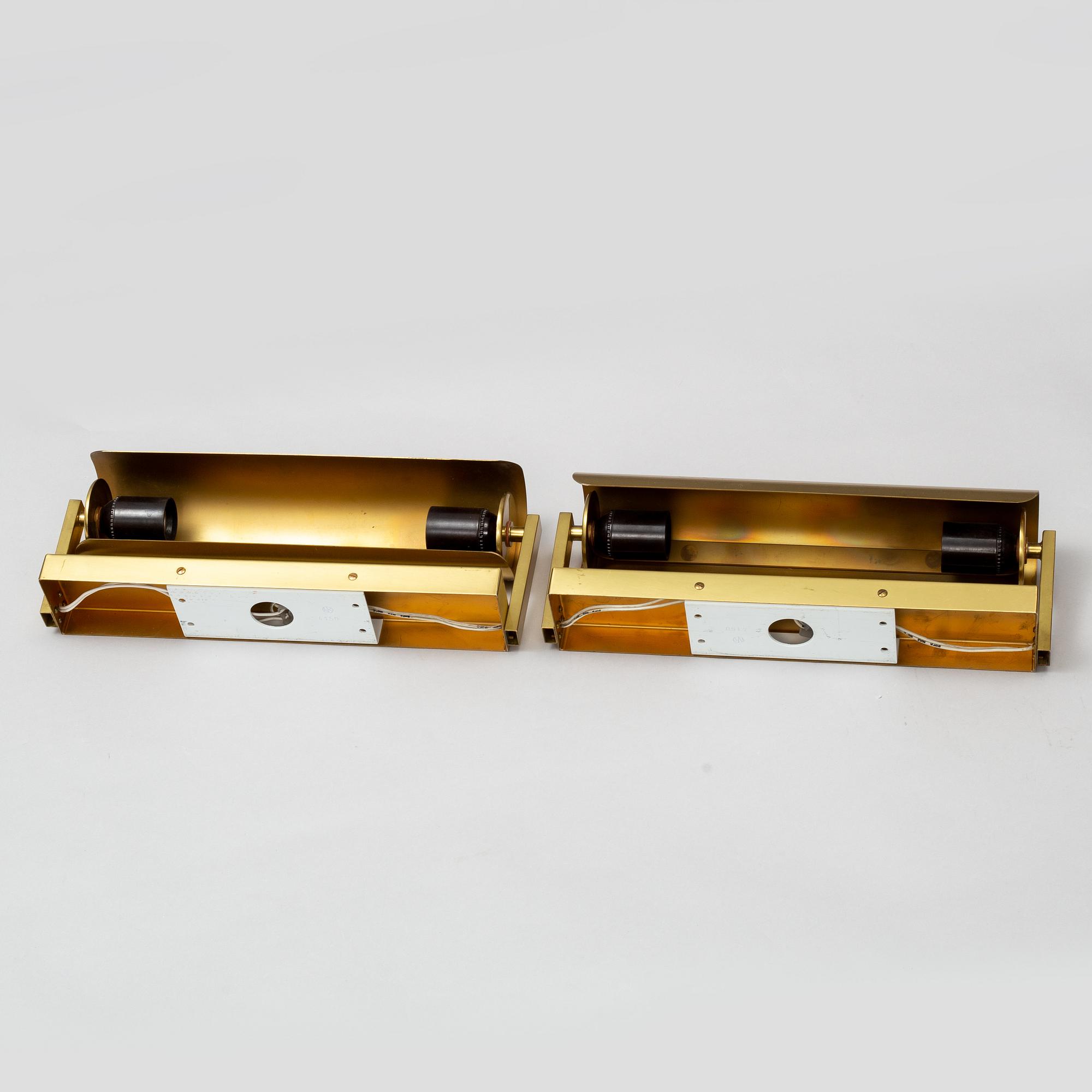 NORDISKA KOMPANIET, a pair of brass wall lights, second half of the 20th Century.