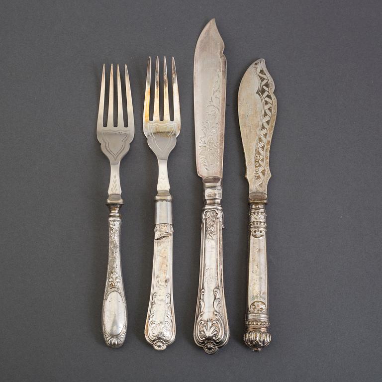 A 22-piece set of silver and silverplated fish cutlery from Sheffield, England, 1904.