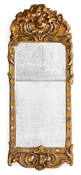 551. A Swedish Rococo mirror.