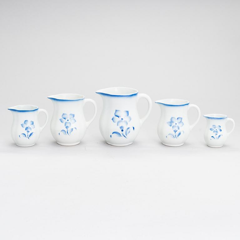 A set of five ceramic milk jugs by Arabia, Finland 1930s-40s.