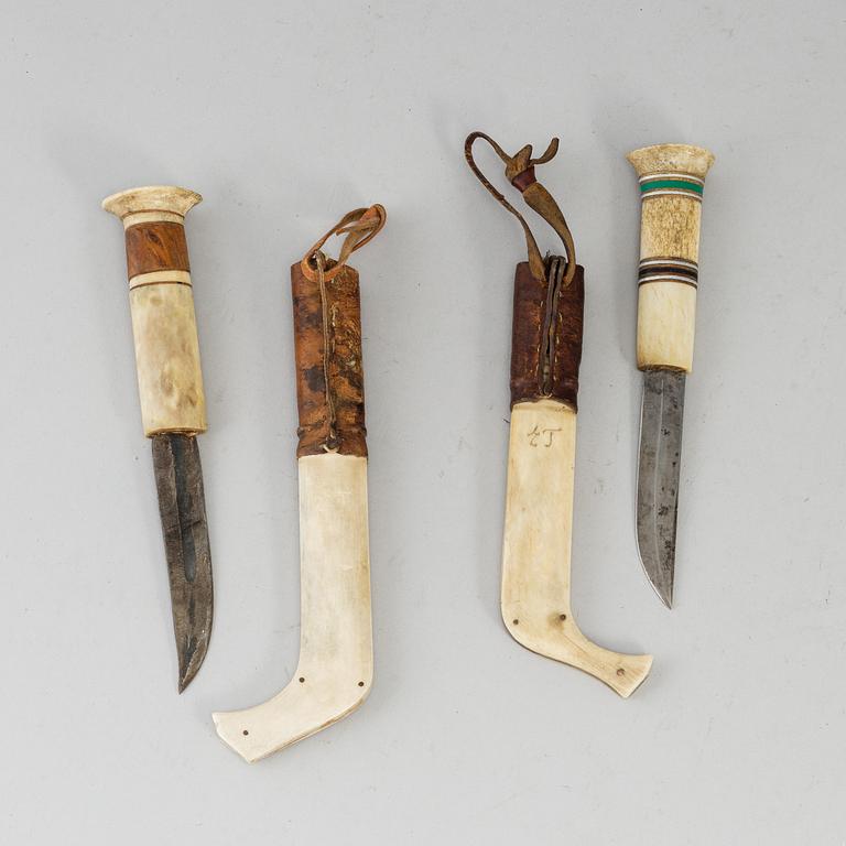 ERIK TUOLJA, two Sami reindeer horn knives, signed ET.