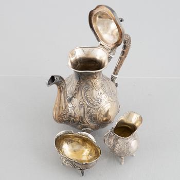 A silver coffee pot, creamer and sugar bowl, including GEWE, Malmö 1973. Rococo style.