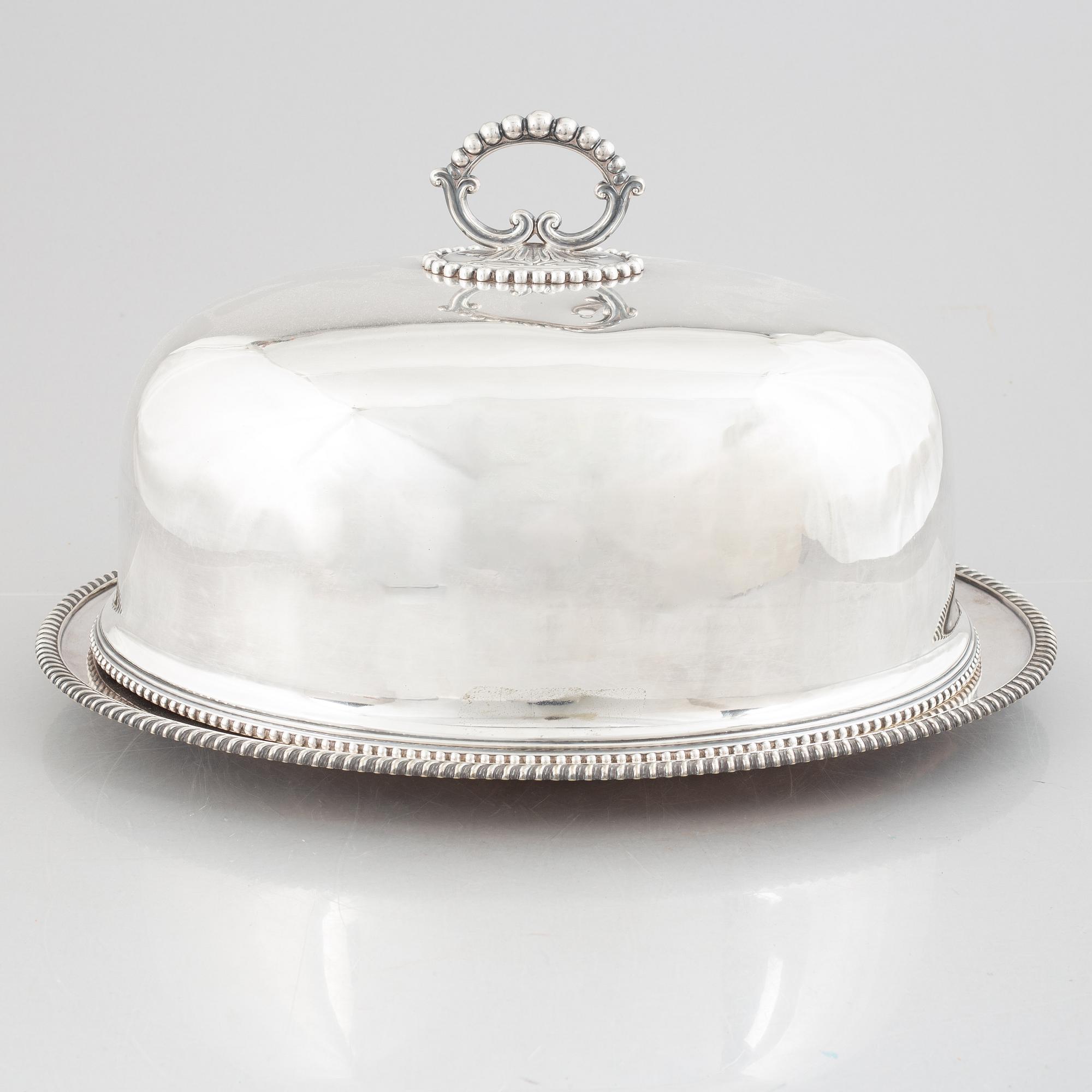 A silver plate food dome cover, Atkin Brothers, Sheffield, England, and a dish, circa 1900.