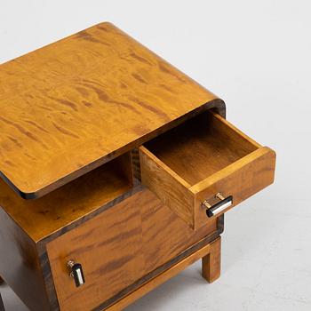 A pair of birch veneered 1930's bedside tables.