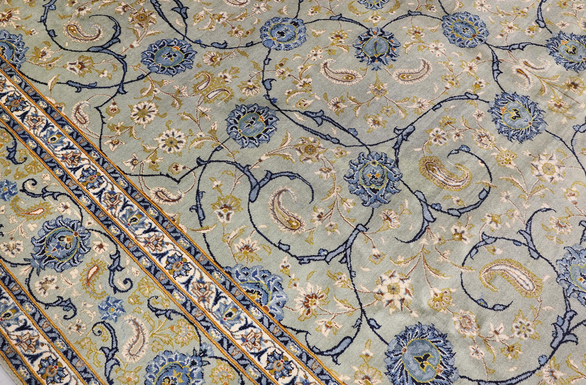 A Royal Keshan carpet, signed, 410 x 307 cm.