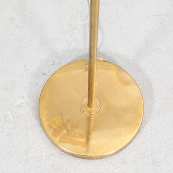 An NK 1960s brass floor lamp.