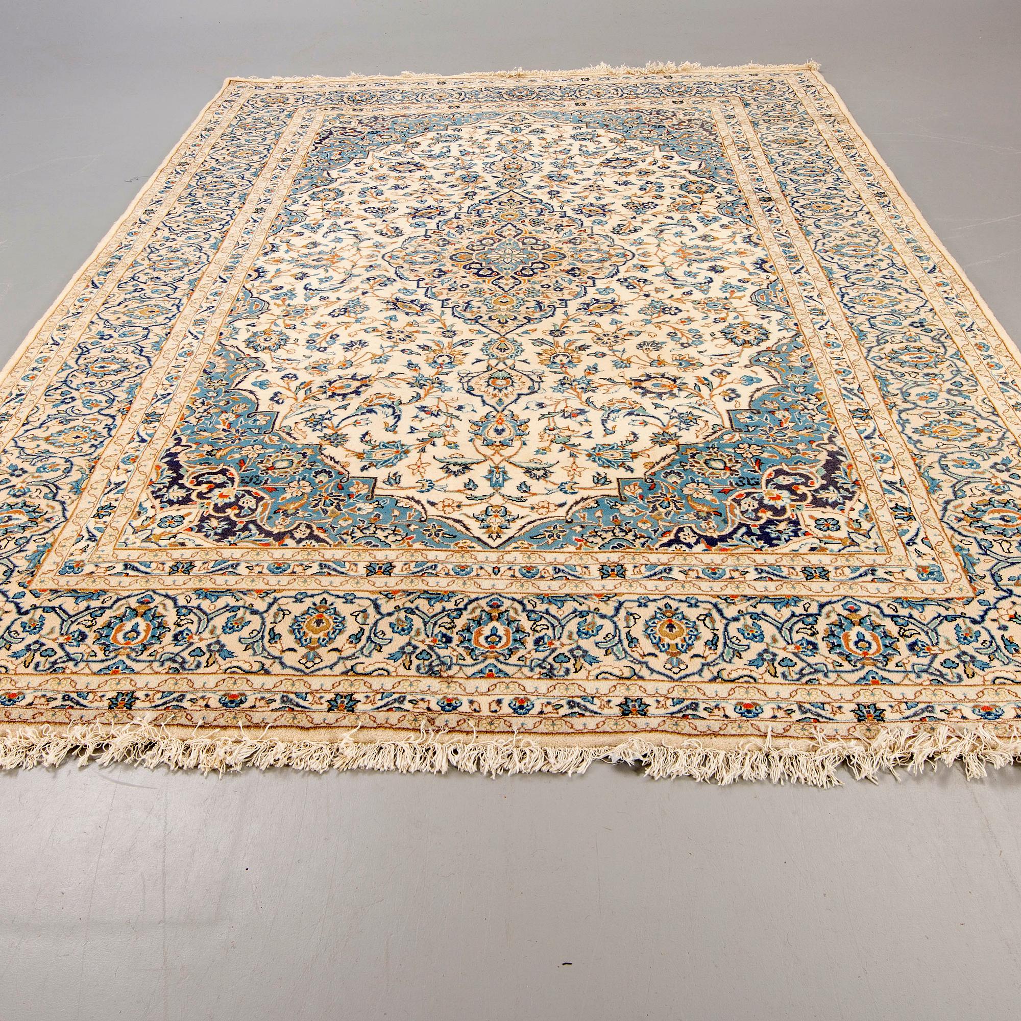 An old Nain carpet ca 359x248 cm.