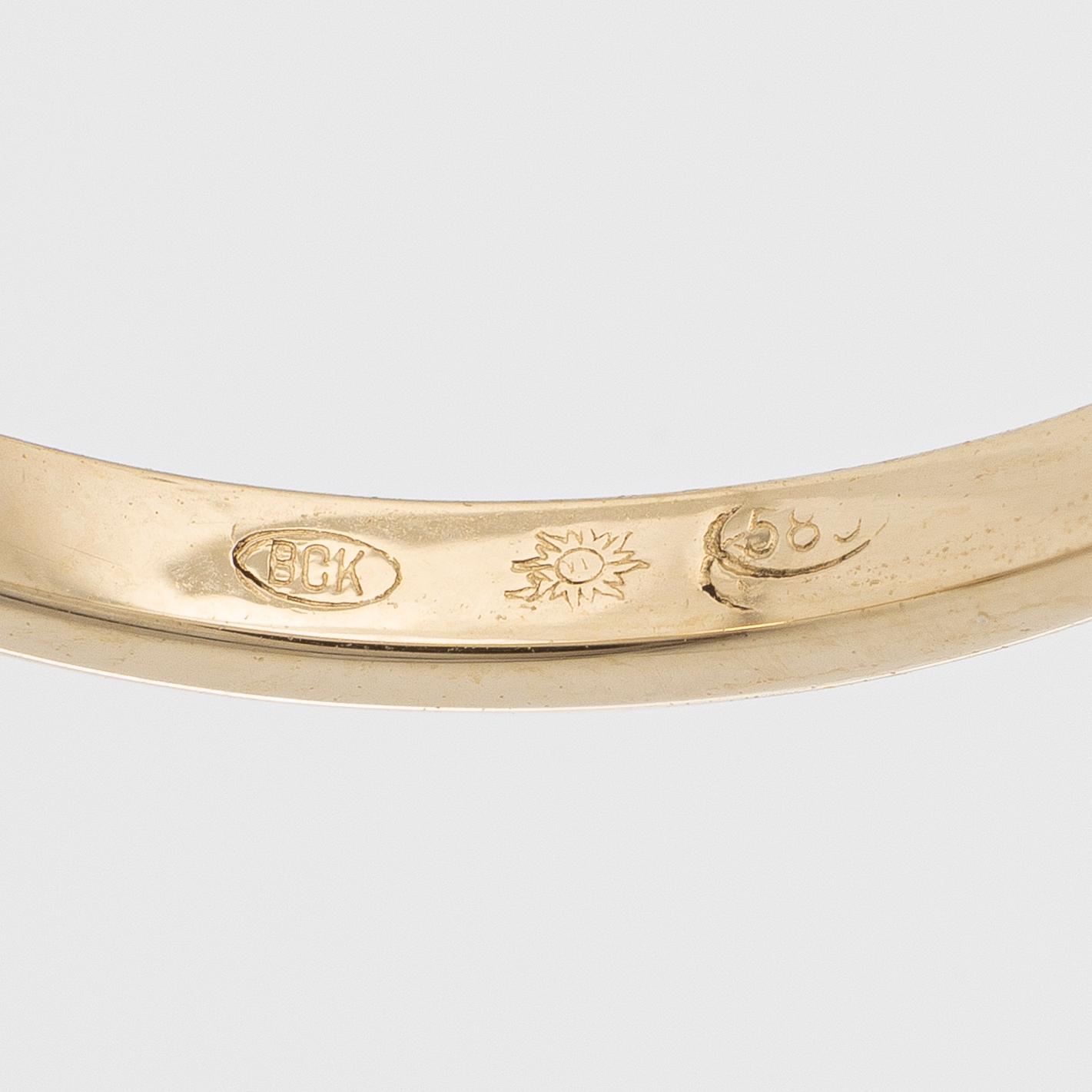 14K gold ring with green tourmaline.