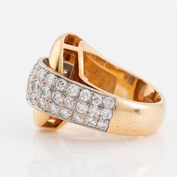 Gold and brilliant cut diamond ring.