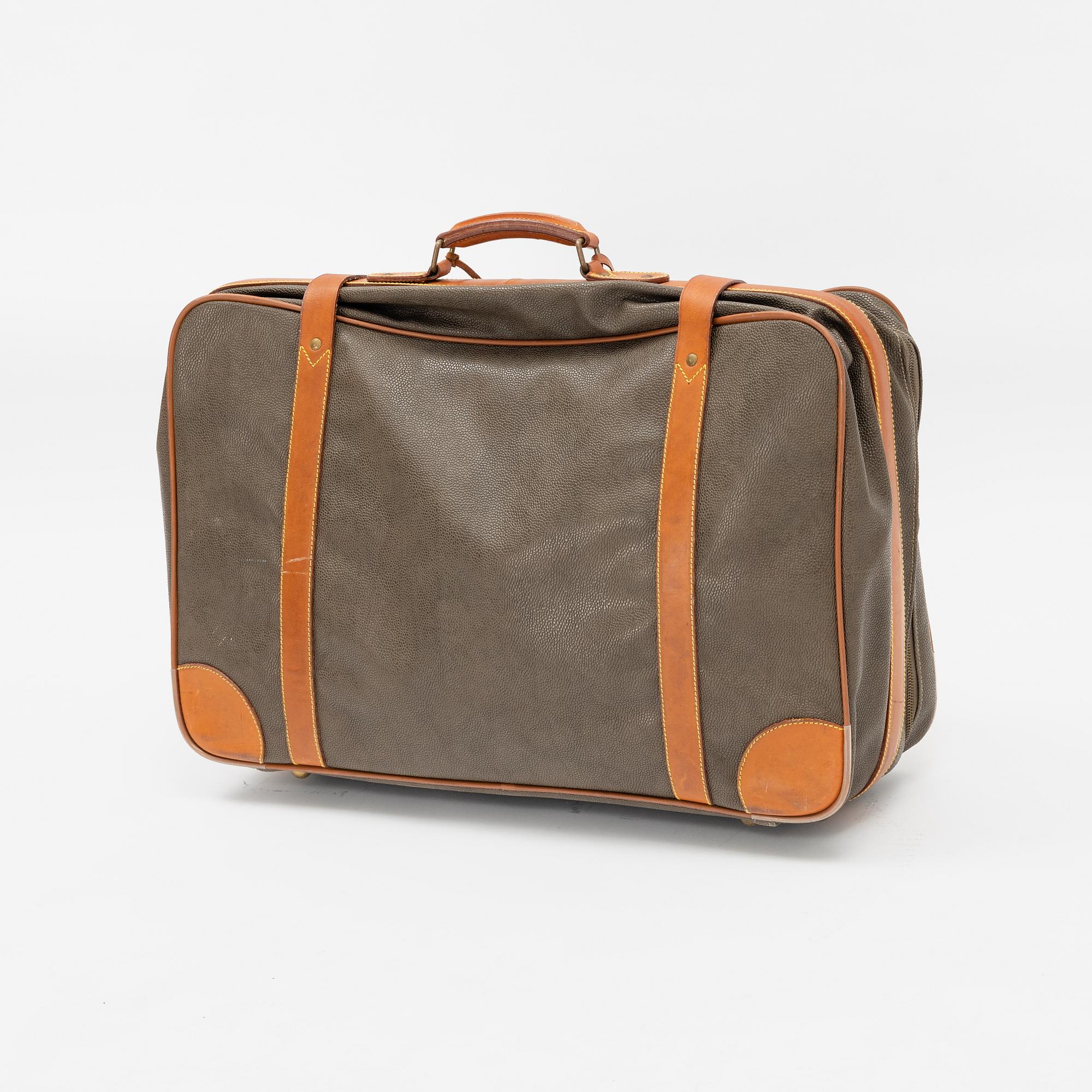 Mulberry, a scotch grain suitcase.