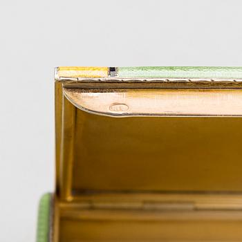 A gilded silver cigarette case with enamel and rose-cut diamonds. Moscow, early 20th century.