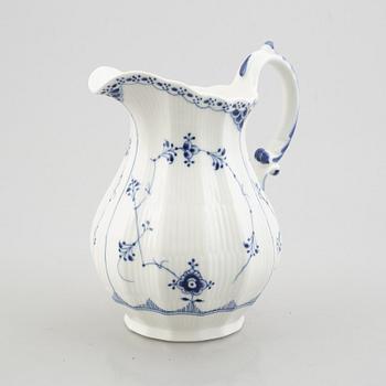 A 'Blue Fluted Half Lace' / 'Musselmalet' pitcher, Royal Copenhagen, model 667, 1898-1923.