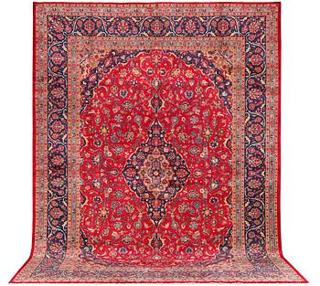 A Keshan carpet, c. 408 x 295 cm.