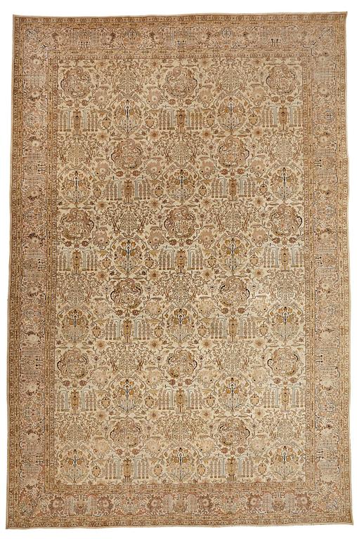 A CARPET, a semi-antique Tabriz, ca 593,5 x 398,5 cm, signed Nämatzade.