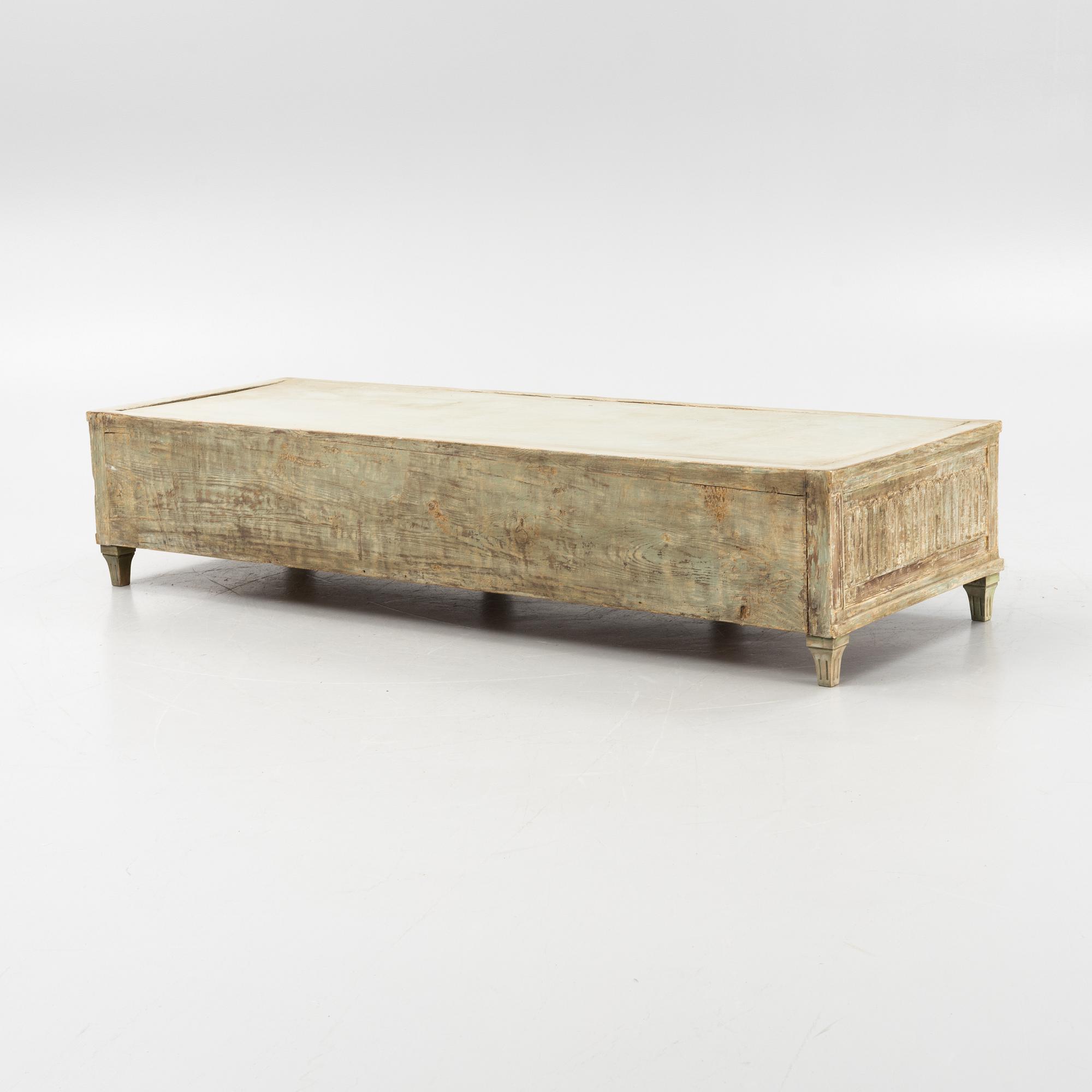 A painted late Gustavian bench, circa 1800.