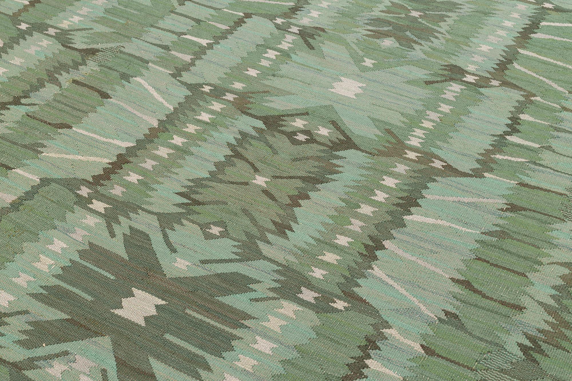 Barbro Nilsson, matta, "Strålblomman, grön", gobelängteknik, ca 516 x 310 cm, signerad AB MMF BN ANNO DOMINE 1954.
