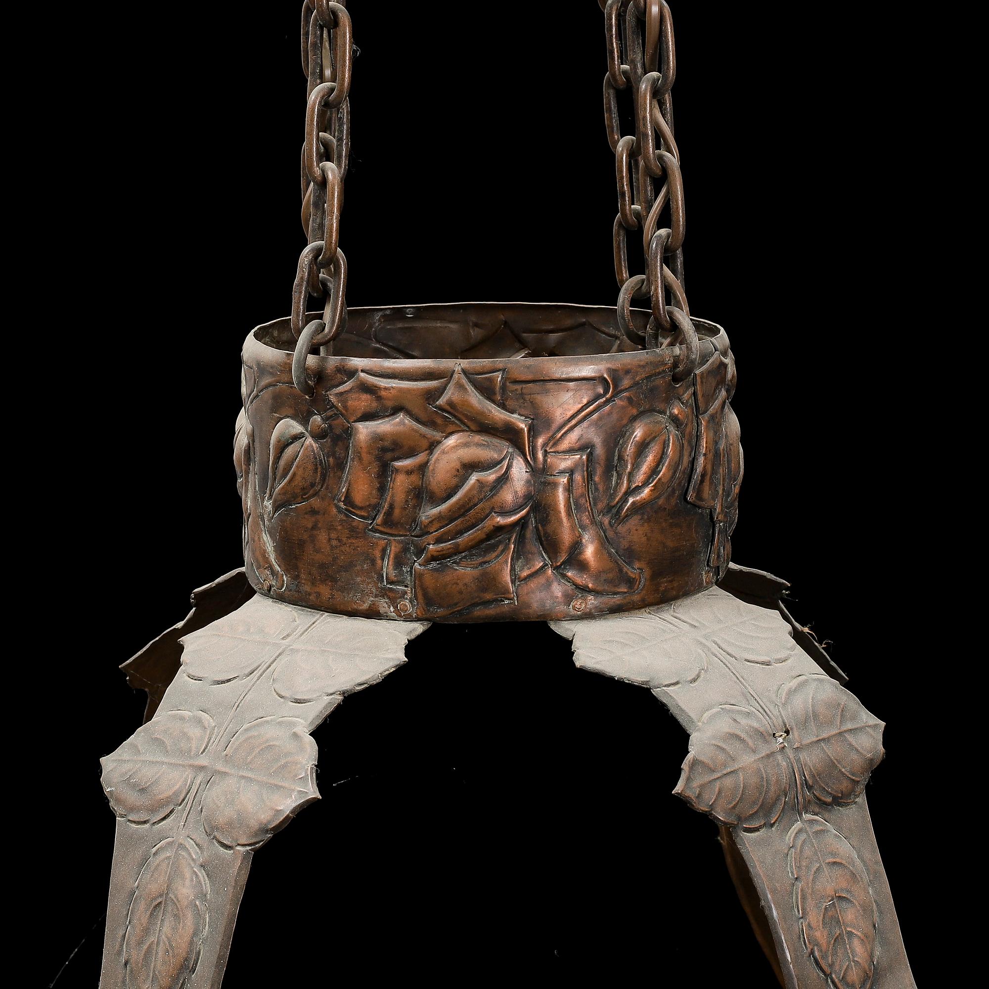 An early 20th Century art noveau copper ceiling light.