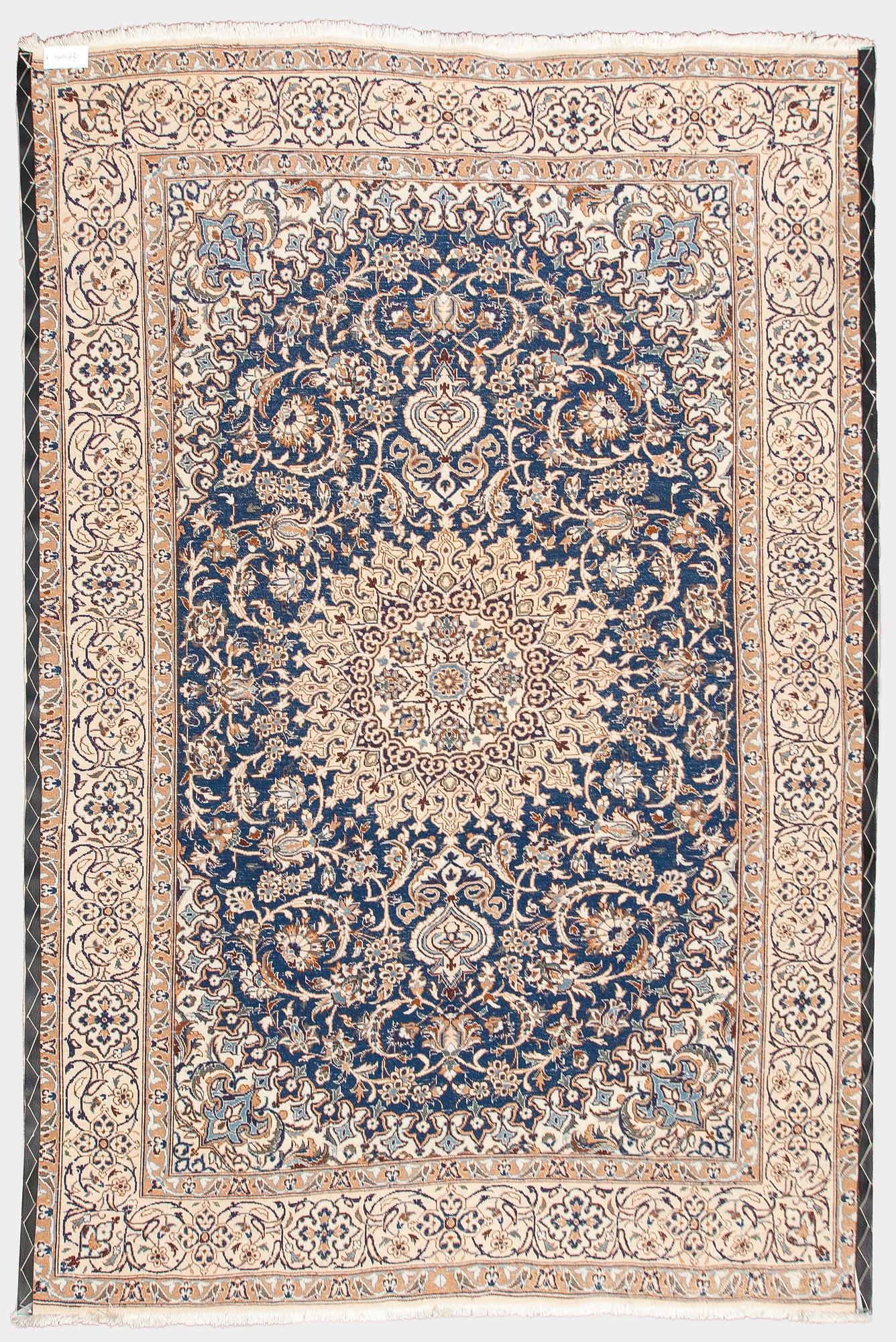 A carpet, Nain, part silk, ca. 295 x 201 cm.