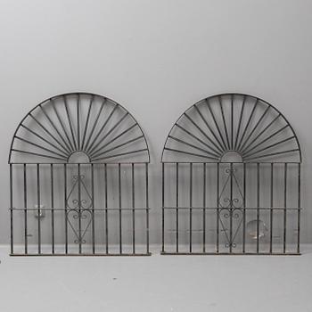 A pair of spanish iron windowgrills.