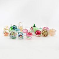 Letter weights/decorative fruits and perfume bottle 18 pcs glass 20th century.