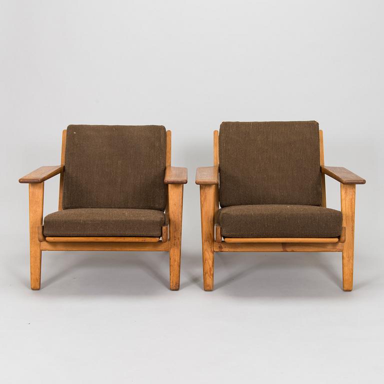 Hans J. Wegner, a pair of 'GE 290' armchairs with ottoman for Getama, Gedsted, Denmark.