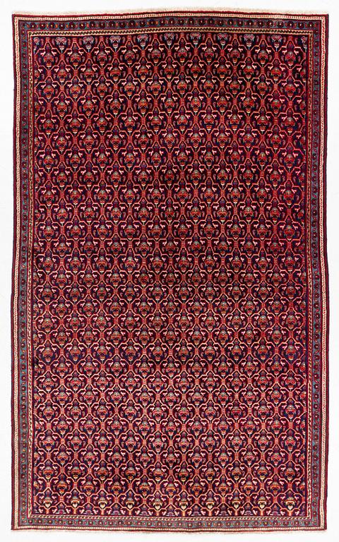 An oriental rug, c. 295 x 180 cm.