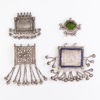 FOUR PENDANTS, silver, North India before 1960's.