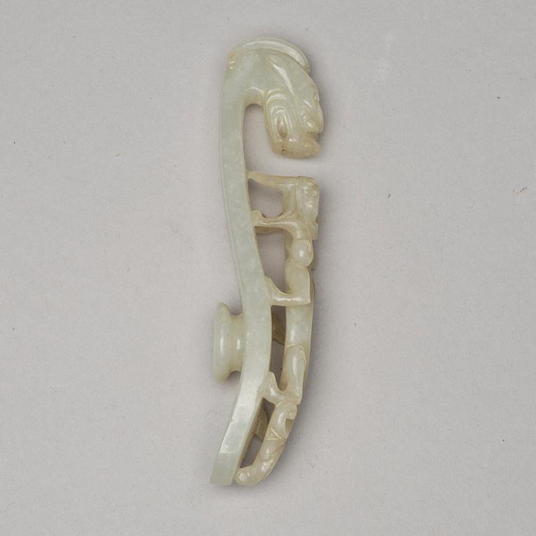 A nephrite belt hook and object, presumably late Qing dynasty, circa 1900.