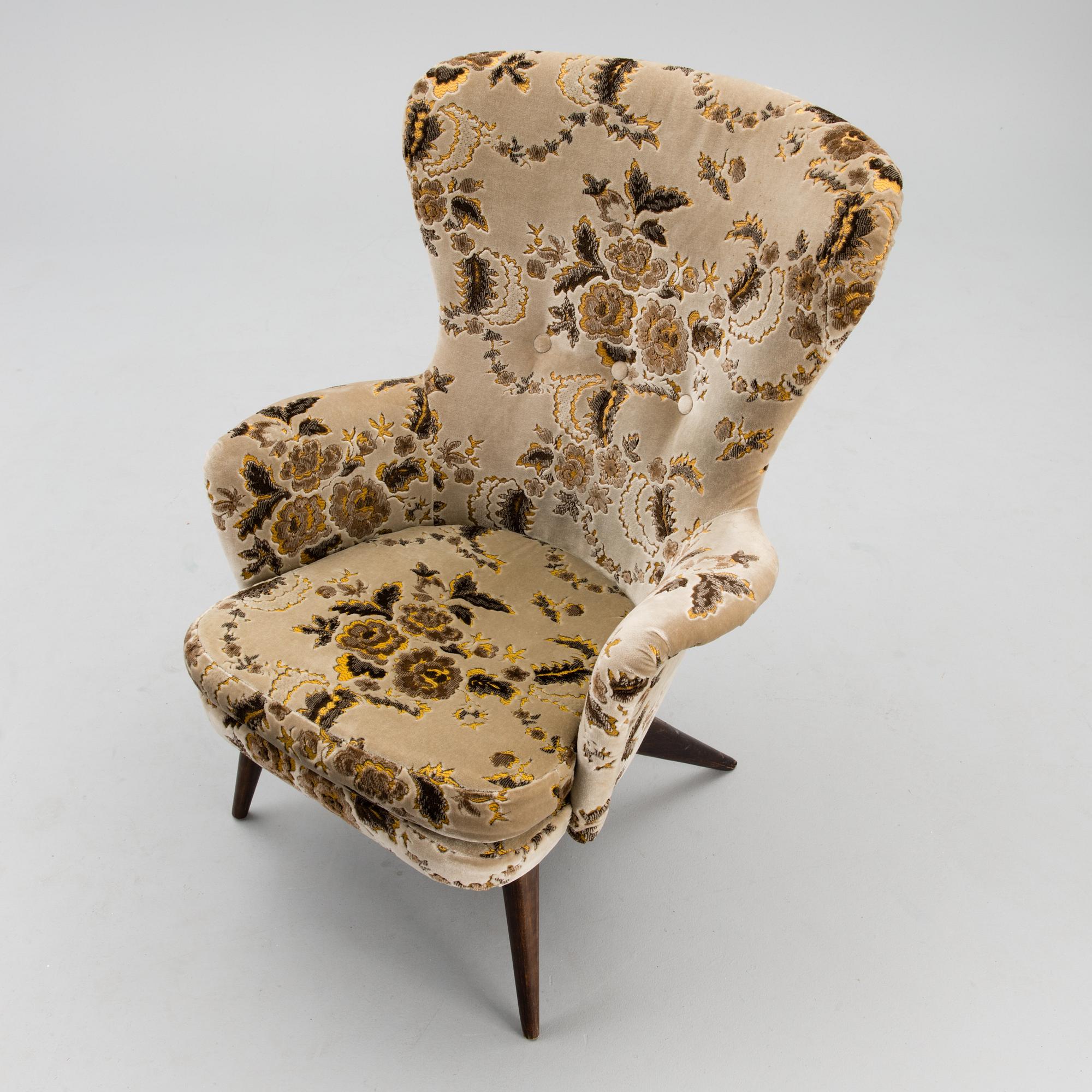 A mid-20th century armchair for Puunveisto Oy - Träsnideri Ab.