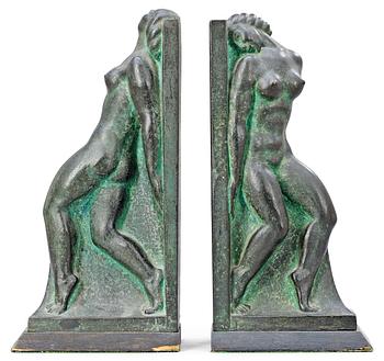 A pair of Axel Gute patinated bronze bookends, Sweden 1920's.