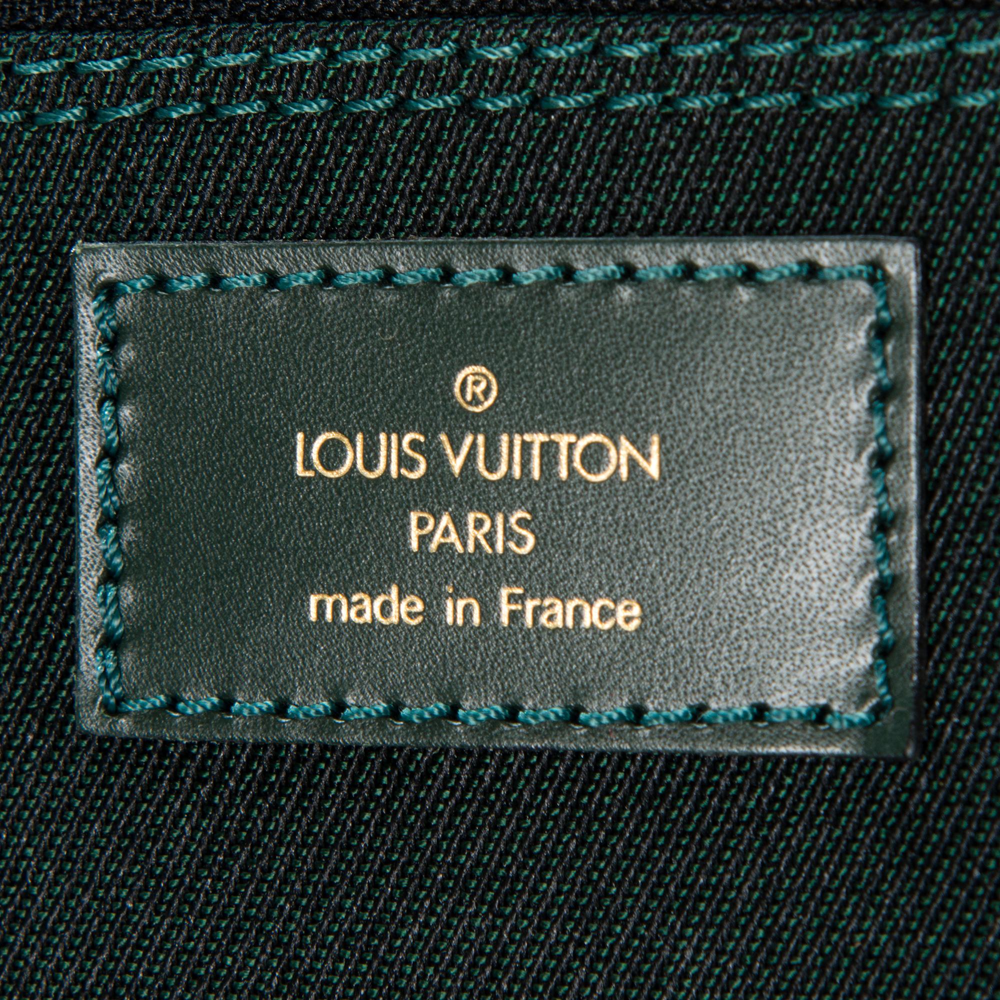 LOUIS VUITTON, TAIGA and NYLON GARMENT BAG.