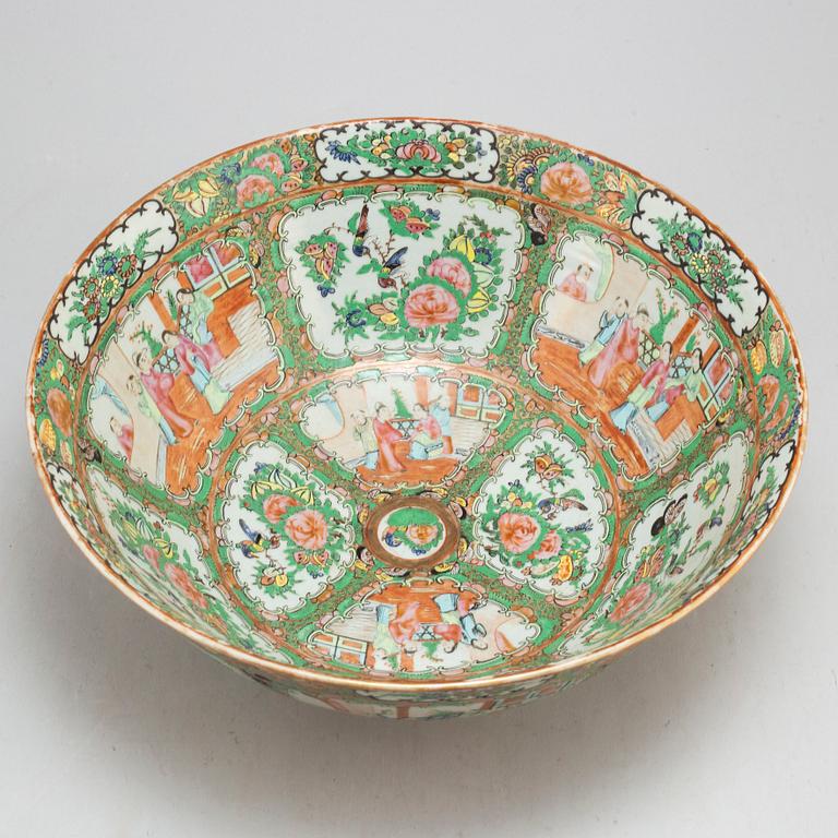 A famille rose 'Canton' punch bowl, Qing dynasty, late 19th century.