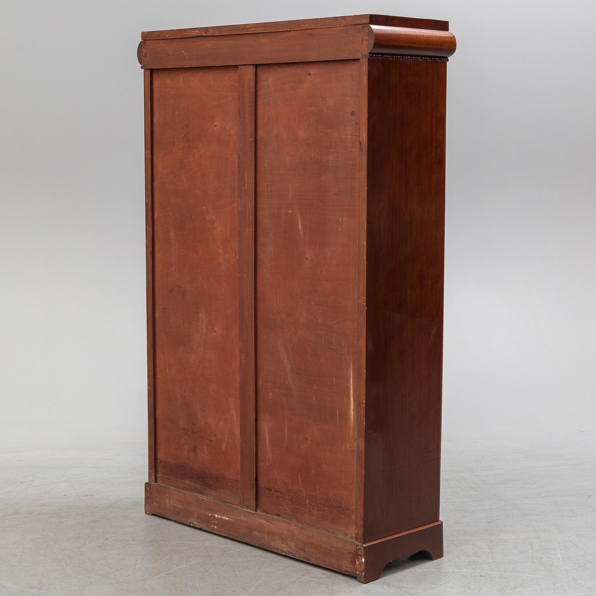 A first half of the 20th century mahogany veneered display cabinet.